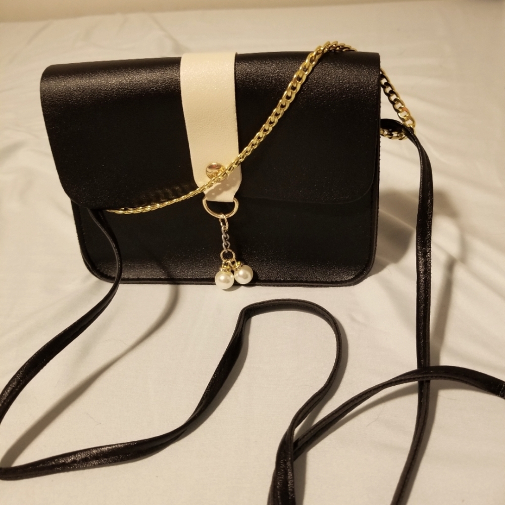Handmade purse with crossbody strap and gold hand held chain strap